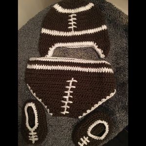 Knitted football helmet, bottom and booties.